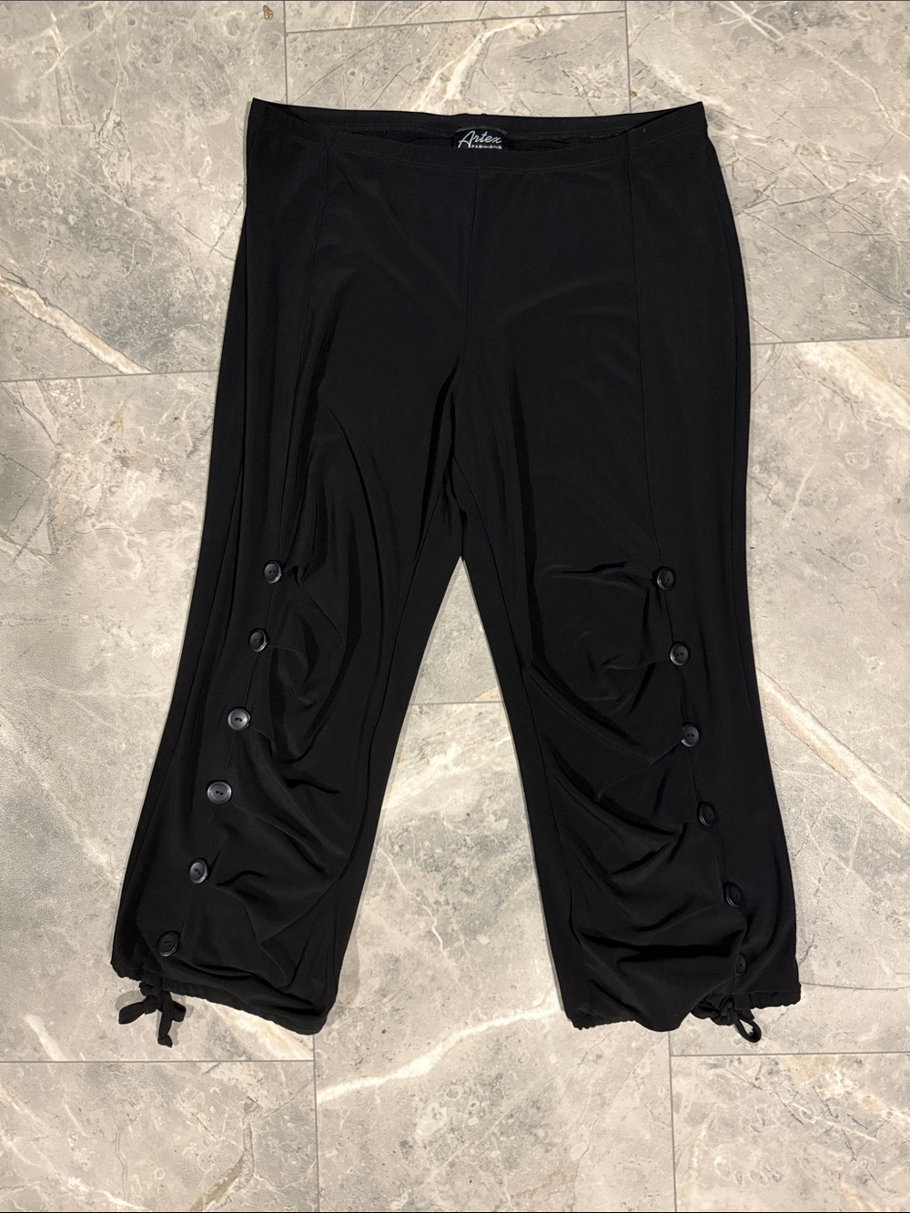 3/$45. Black Button-Trim Capri Pants